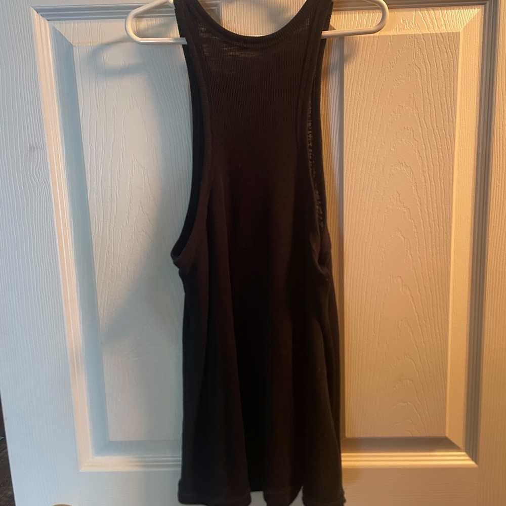 Two swing free people tank tops